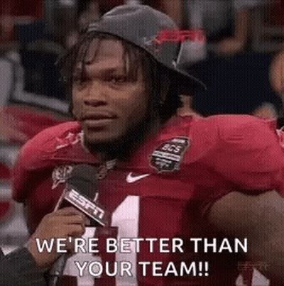 A Football Player Is Talking Into A Microphone And Says `` We 'Re Better Than Your Team ! '' GIF