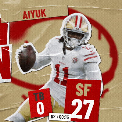 A Football Player Named Aiyuk Is Holding A Ball GIF