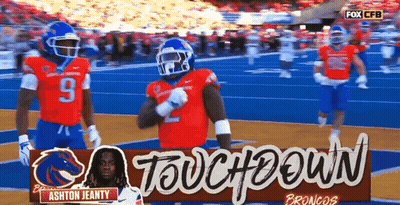 A Football Player Named Ashton Jeanty Stands On The Field GIF