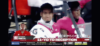 A Football Player Named Divonta Smith Is On A TV Screen GIF