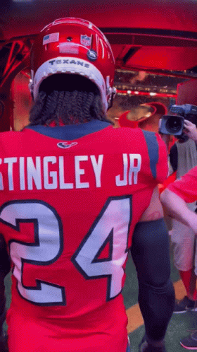 A Football Player Named Stingley Jr Wears A Red Jersey With The Number 24 On It GIF