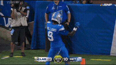 A Football Player Named Williams Stands On The Field GIF