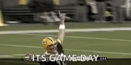 A Football Player On A Field With The Words " It 'S Game Day " On The Bottom GIF