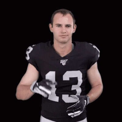 A Football Player Wearing A Black Jersey With The Number 13 On It GIF