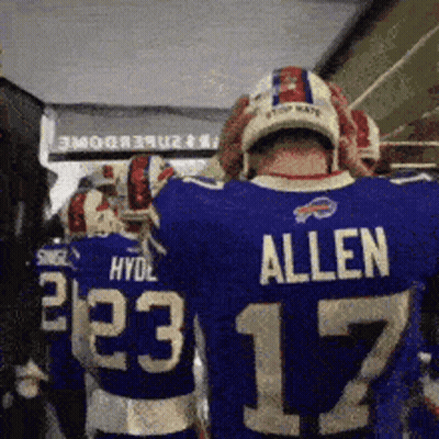 A Football Player Wearing A Blue Jersey That Says Allen 17 GIF