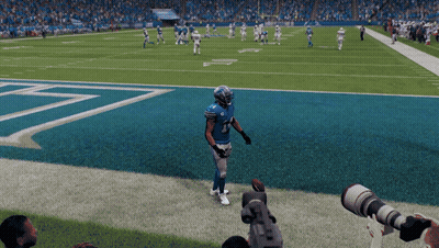 A Football Player Wearing A Blue Jersey With The Number 1 On It GIF