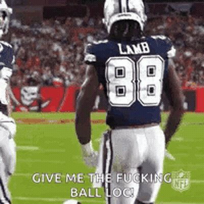 A Football Player Wearing A Blue Jersey With The Number 88 On It Is Running On The Field . GIF