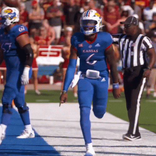A Football Player Wearing A Blue Kansas Jersey GIF
