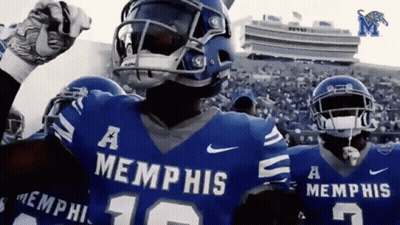 A Football Player Wearing A Blue Memphis Jersey GIF