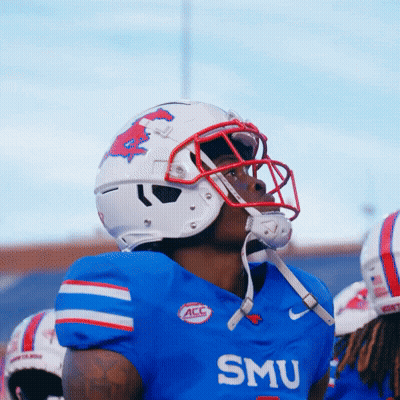 A Football Player Wearing A Blue Smu Jersey GIF