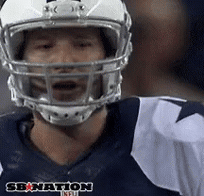 A Football Player Wearing A Helmet And A Jersey That Says Sbnation On It GIF