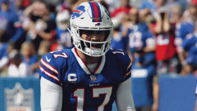 A Football Player Wearing A Helmet And Jersey With The Number 17 On It GIF