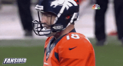 A Football Player Wearing A Helmet And Jersey With The Number 18 On It GIF