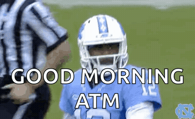 A Football Player Wearing A Helmet Is Standing Next To A Referee And Says Good Morning Atm GIF