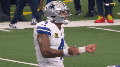 A Football Player Wearing A Helmet That Has A Star On It GIF