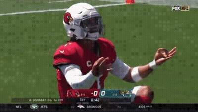 A Football Player Wearing A Helmet That Says Cardinals On It GIF