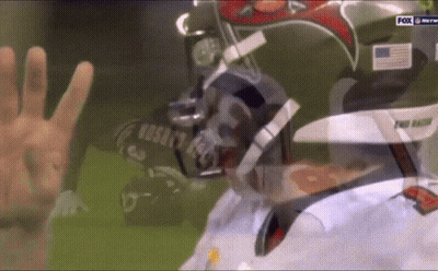A Football Player Wearing A Helmet That Says Pro Falcons GIF
