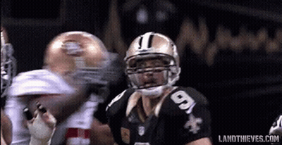 A Football Player Wearing A Helmet With The Number 9 On It GIF