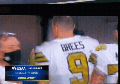 A Football Player Wearing A Jersey That Says Brees On It GIF