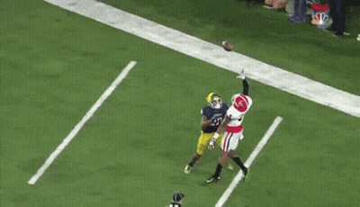 A Football Player Wearing A Jersey That Says Notre Dame On It GIF
