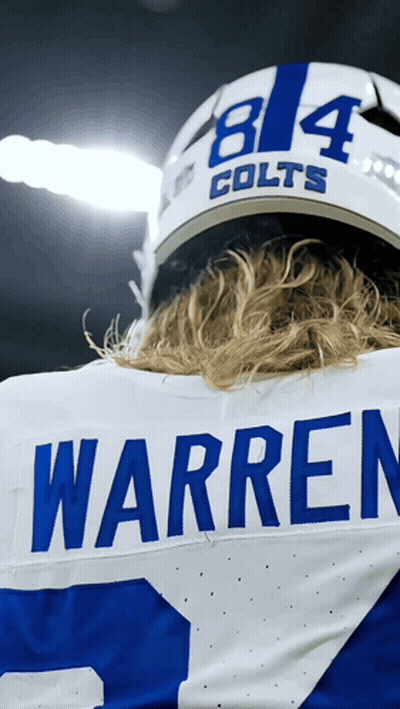 A Football Player Wearing A Jersey That Says Warren On The Back GIF