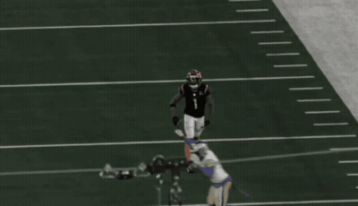 A Football Player Wearing A Jersey With The Letter K On It GIF