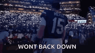 A Football Player Wearing A Jersey With The Number 15 On It GIF