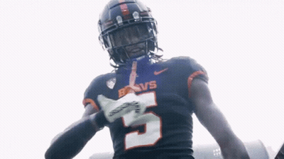 A Football Player Wearing A Jersey With The Number 5 GIF