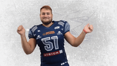 A Football Player Wearing A Jersey With The Number 51 On It GIF