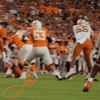 A Football Player Wearing A Jersey With The Number 53 On It GIF