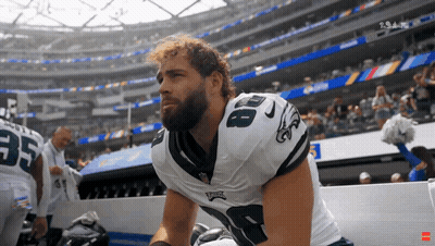 A Football Player Wearing A Jersey With The Number 8 On It GIF