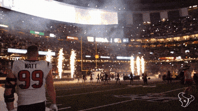 A Football Player Wearing A Jersey With The Number 99 GIF