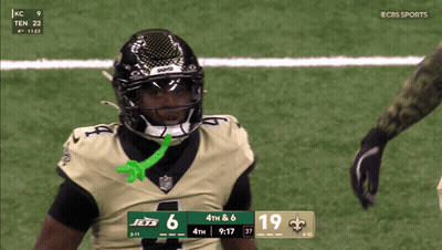A Football Player Wearing A Jets Jersey Stands On A Field GIF