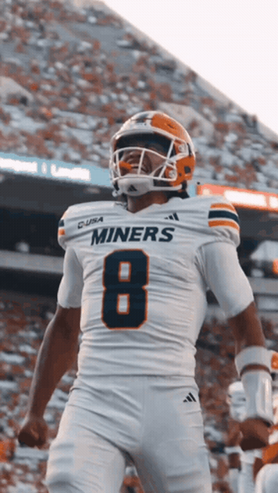 A Football Player Wearing A Miners Jersey With The Number 8 GIF