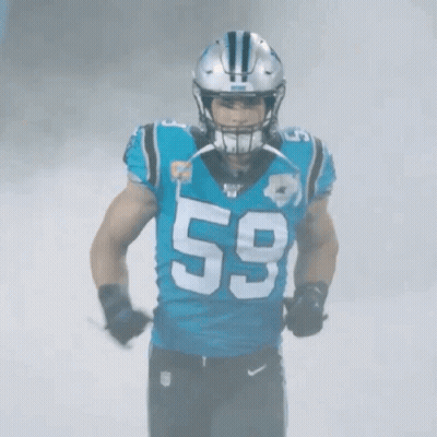 A Football Player Wearing A Number 59 Jersey GIF