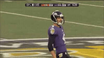 A Football Player Wearing A Number 9 Jersey Is Dancing On The Field GIF
