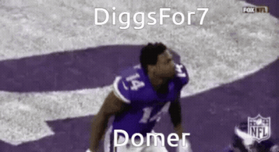 A Football Player Wearing A Purple Jersey With The Number 14 On It Is Jumping In The Air . GIF
