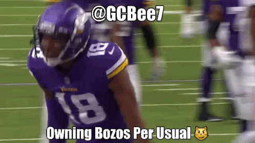 A Football Player Wearing A Purple Jersey With The Number 18 On It GIF