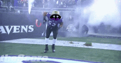 A Football Player Wearing A Purple Jersey With The Number 22 On It GIF