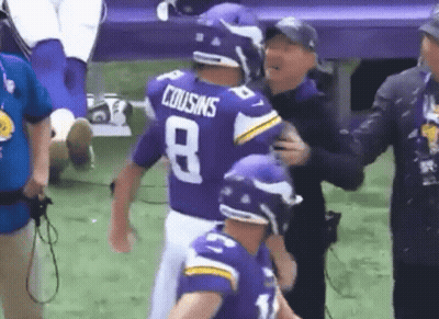 A Football Player Wearing A Purple Jersey With The Number 8 On It GIF