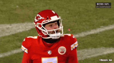 A Football Player Wearing A Red Helmet With The Number 15 On It GIF