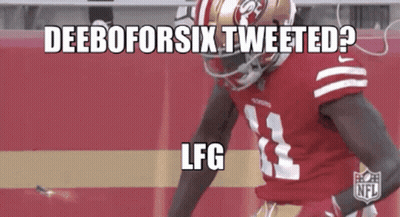 A Football Player Wearing A Red Jersey With The Number 33 On It GIF