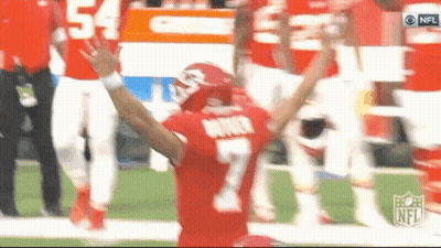 A Football Player Wearing A Red Jersey With The Number 7 On It GIF