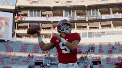A Football Player Wearing A Red Jersey With The Number 9 On It GIF