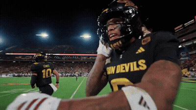 A Football Player Wearing A Sun Devils Jersey GIF