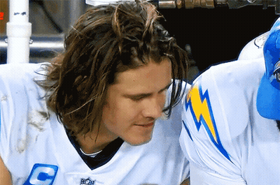 A Football Player Wearing A White Jersey With The Letter C On It GIF