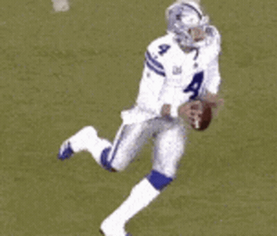 A Football Player Wearing A White Jersey With The Number 4 On It GIF