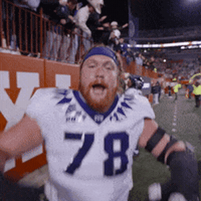 A Football Player Wearing A White Jersey With The Number 78 GIF