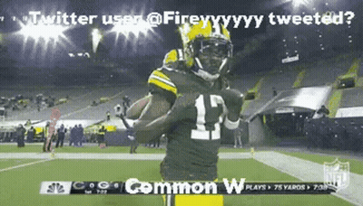 A Football Player Wearing Number 15 Is Running With The Ball GIF