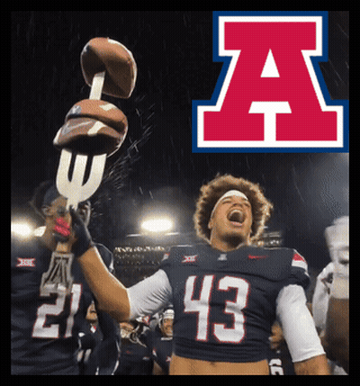 A Football Player Wearing Number 43 Holds Up A Trophy GIF